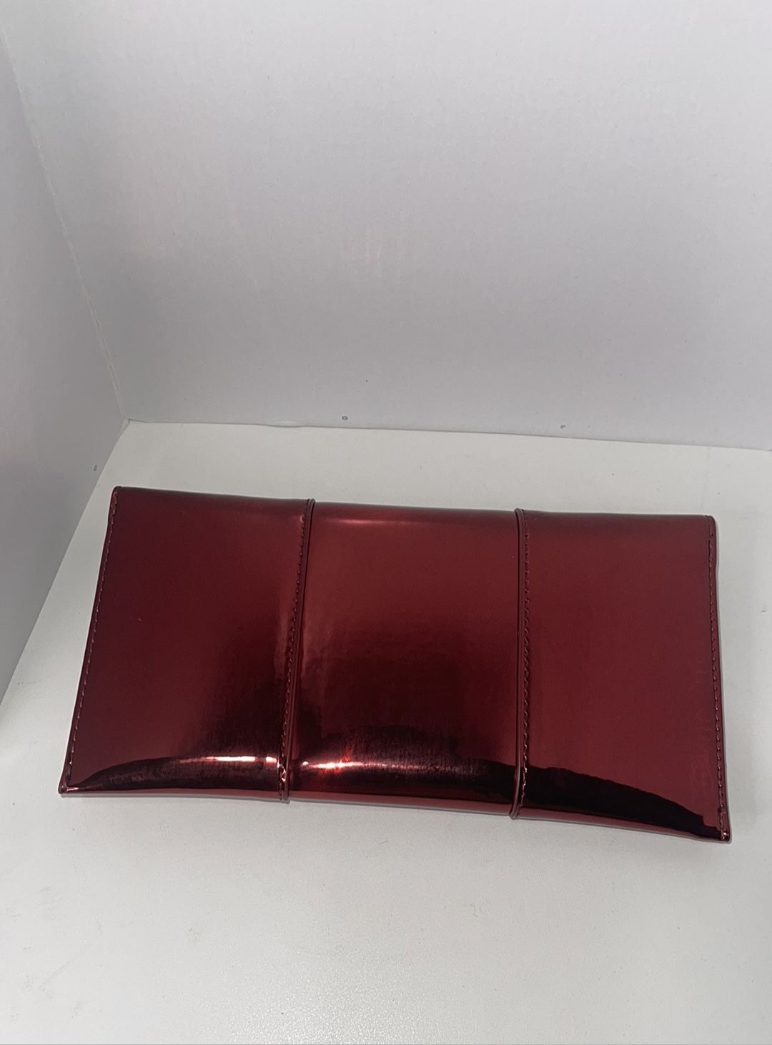 Aldo Red Metallic Clutch